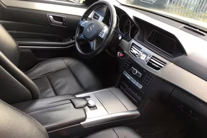 Mercedes executive car interior for Athens city centre to Athens International Airport chauffeur transfer service