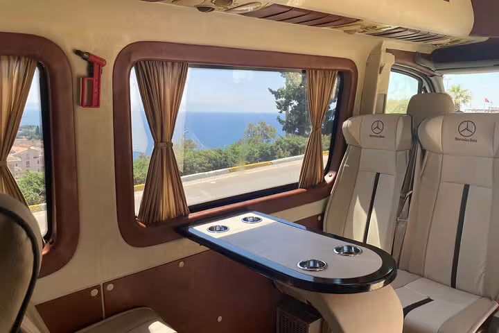 Executive Mercedes minivan interior with table, ideal for private Istanbul sightseeing to Grand Bazaar and Hippodrome