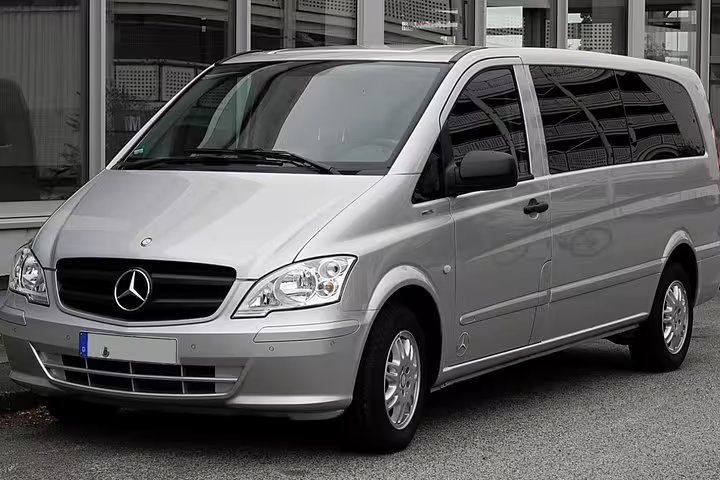 Modern silver Mercedes minivan used for private transfer service from Naples city or airport to Positano