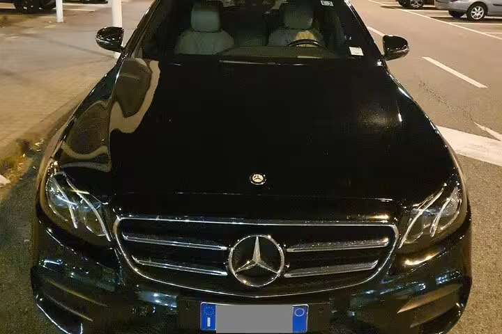 Luxury black Mercedes sedan for private door-to-door transfer from Verona to Rapallo Italy