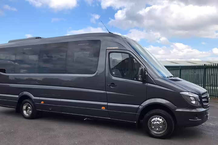 Dark grey Mercedes Sprinter minibus for private Athens city tour with hotel pickup