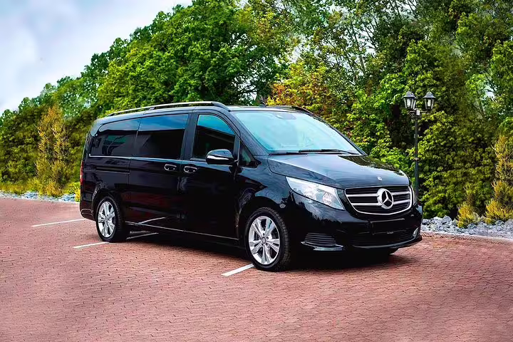Luxury black Mercedes V-Class minivan for private transfer from Malaga to Malaga Airport AGP departure