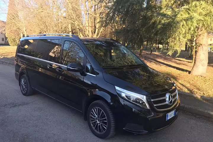 Sleek black Mercedes V-Class minivan for private transfer from Malaga city to Malaga Airport AGP departure