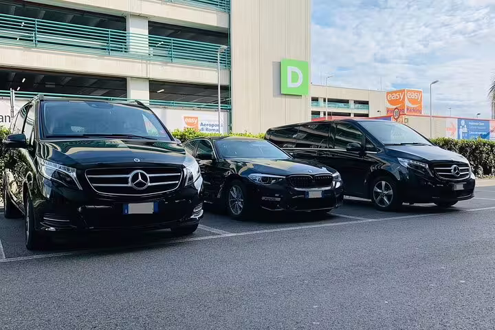 Luxury black Mercedes vans and BMW sedan parked at airport for private transfer Stockholm Port to Arlanda Airport ARN