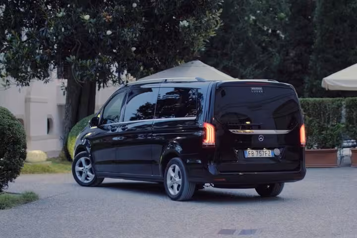 Luxurious Mercedes van ready for transfer from Cortina d'Ampezzo to Venice, offering comfort and convenience.
