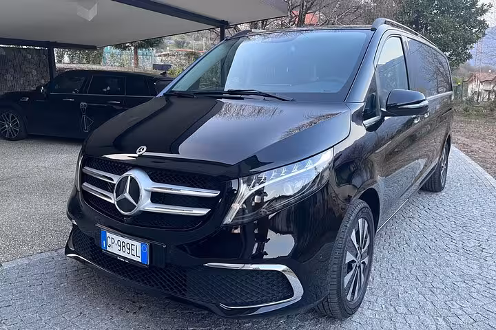 Stylish black Mercedes van ready for transport, perfect for Ravenna Cruise Terminal to Bologna Airport transfers.