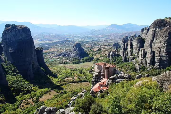 Panoramic Meteora rock pillars and monastery overlook, scenic stop on Delphi and Meteora private tour Athens