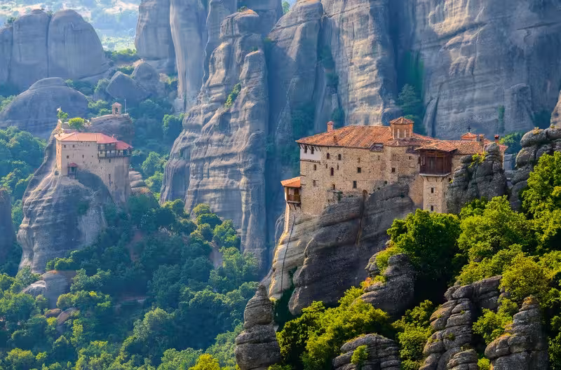 Meteora monasteries perched on dramatic rock pillars in Greece, highlight of a 2 day Delphi & Meteora tour