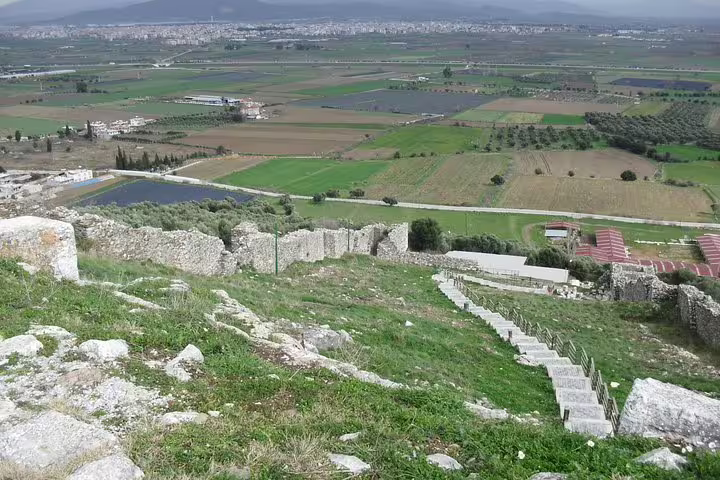 Metropolis Ancient City hillside ruins overlooking vineyards and plains, scenic stop on a wine tasting tour