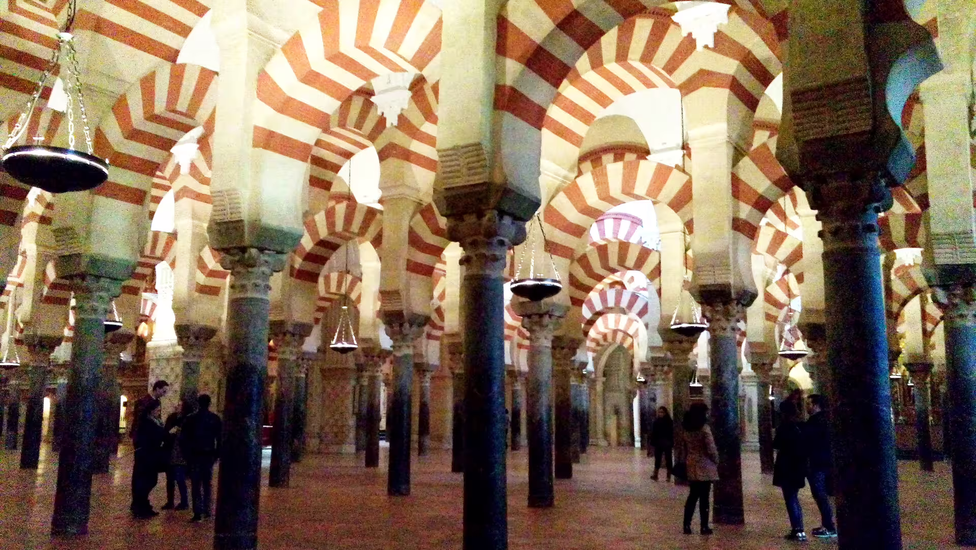 Mezquita-Catedral de Córdoba interior with red-and-white arches on a private guided walking tour in Spain