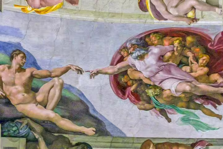 Detail of Michelangelo’s Creation of Adam in the Sistine Chapel, featured on Vatican Papal Audience skip-the-line tours