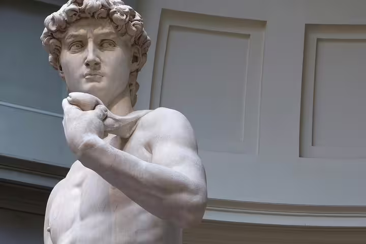 Close-up of Michelangelo’s David statue at Florence Accademia Gallery featured on a small group tour with expert guide