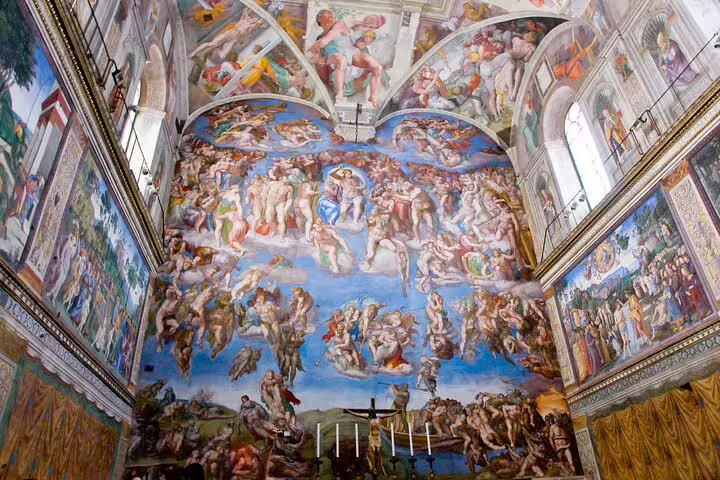 Detail of Michelangelo’s Last Judgment fresco in the Sistine Chapel on a Vatican Museums exclusive private family tour
