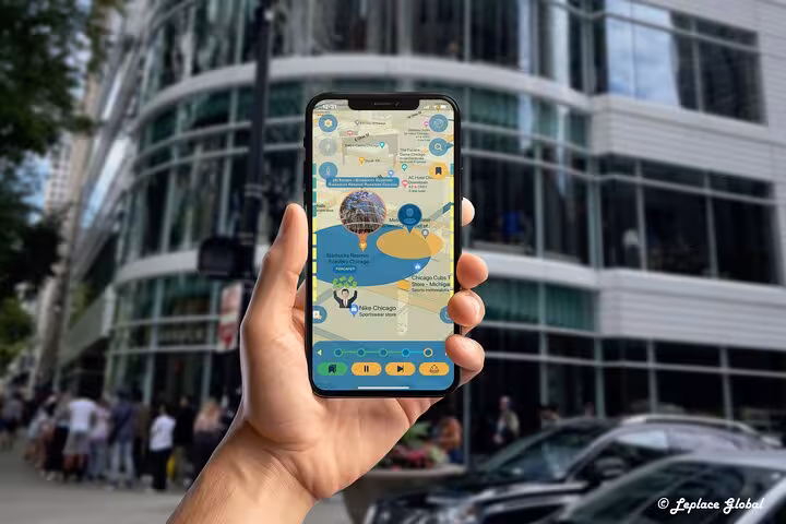 Explorer using Michigan Avenue walking tour app on smartphone to discover Chicago hidden gems and landmarks