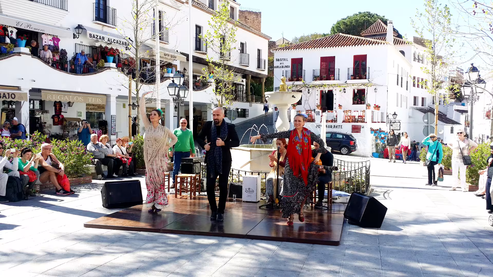 Flamenco show in Mijas Pueblo square on a private tour from Costa del Sol, with white village backdrop