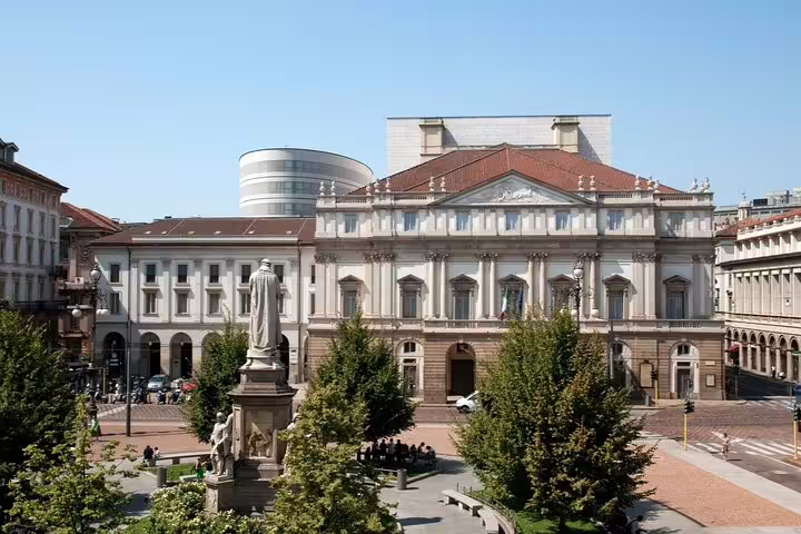 Piazza della Scala with Leonardo da Vinci statue and Teatro alla Scala opera house, Milan
