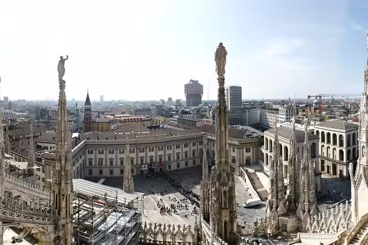 View over Milan Duomo rooftops and Piazza del Duomo, start of a private customizable day tour to Lake Como