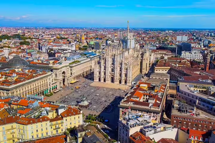 Aerial view of Milan Cathedral and Piazza del Duomo surrounded by the historic city center