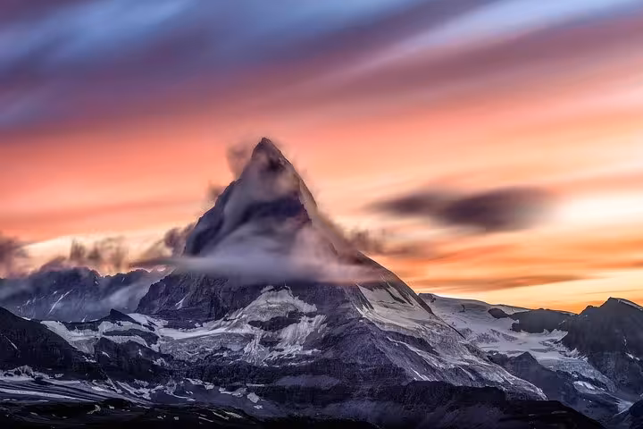 Breathtaking sunset over the Matterhorn, ideal backdrop for private transfer tours from Milan to Zermatt Tasch.