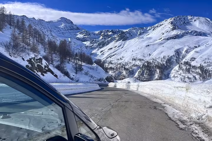 Scenic view of snow-capped mountains from a private transfer vehicle en route from Milan to Zermatt Tasch.