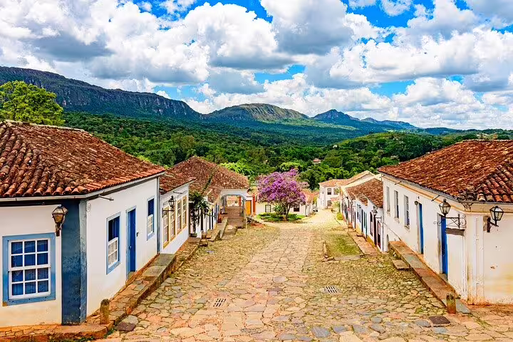 Charming cobblestone street in Minas Gerais with colonial architecture on the Gold Route tour.