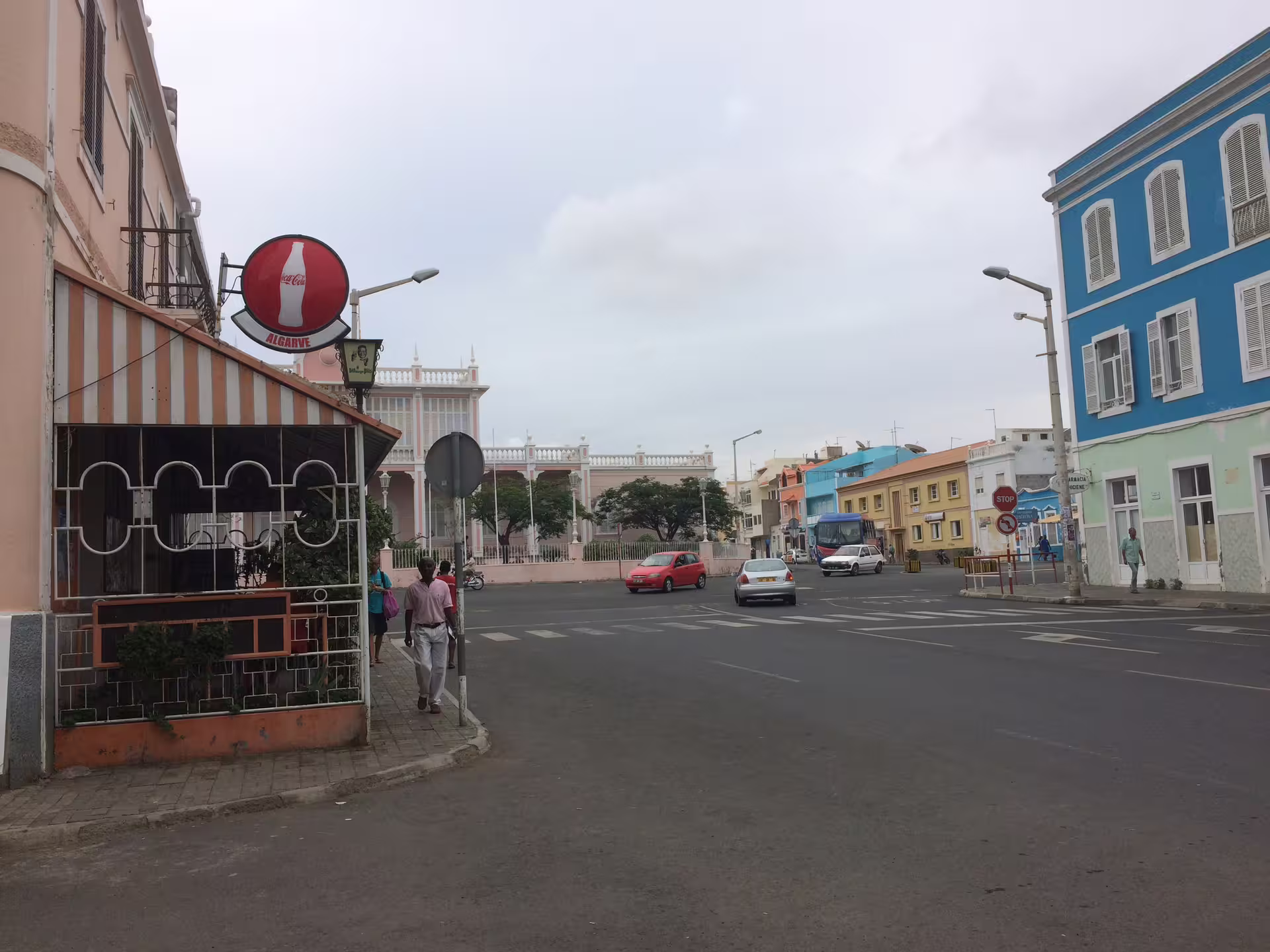Colorful street scene in Mindelo, São Vicente, featuring vibrant colonial architecture, perfect for a cultural half-day tour.