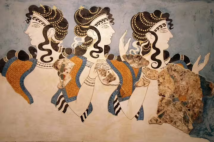 Minoan fresco of three women at Knossos Palace, a highlight on a private full-day tour from Heraklion