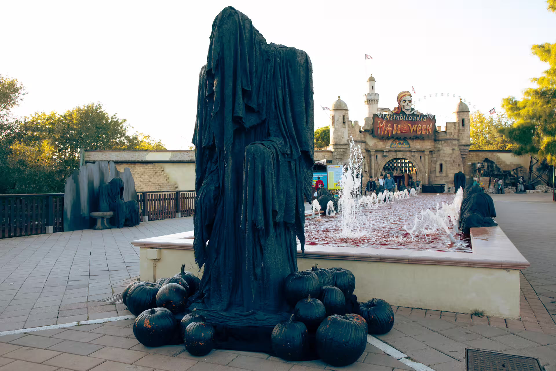 Mirabilandia park entrance with Halloween decor, spooky statue and fountain, Emilia-Romagna day ticket