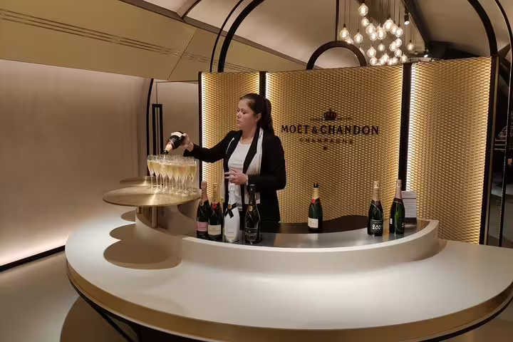 Moët & Chandon cellar bar in Épernay with champagne pours, part of small-group Champagne day trip from Paris