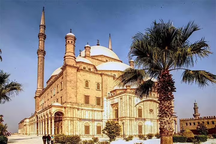 Exterior view of Mohamed Ali Mosque at Cairo Citadel with palm trees, part of Egyptian Museum and Nile dinner cruise tour