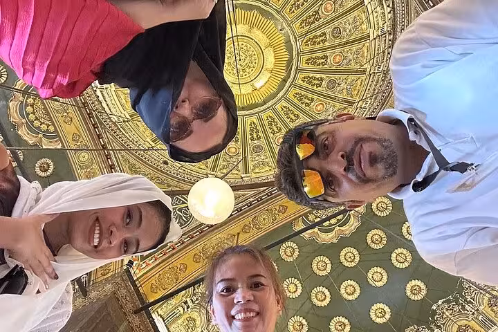 Visitors selfie under the ornate dome inside Mohamed Ali Mosque, part of Citadel and Old Cairo guided tour