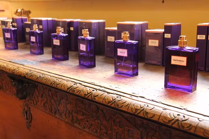 Molinard perfume bottles including Patchouli and Vanille displayed on ornate wooden counter in French Riviera boutique