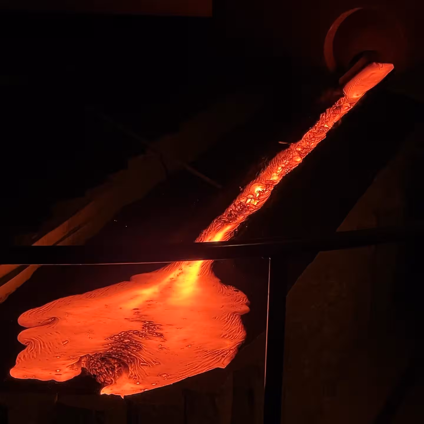 Molten lava glowing inside the Lava Show venue, offering visitors a safe and unforgettable encounter with Iceland’s volcanic forces.
