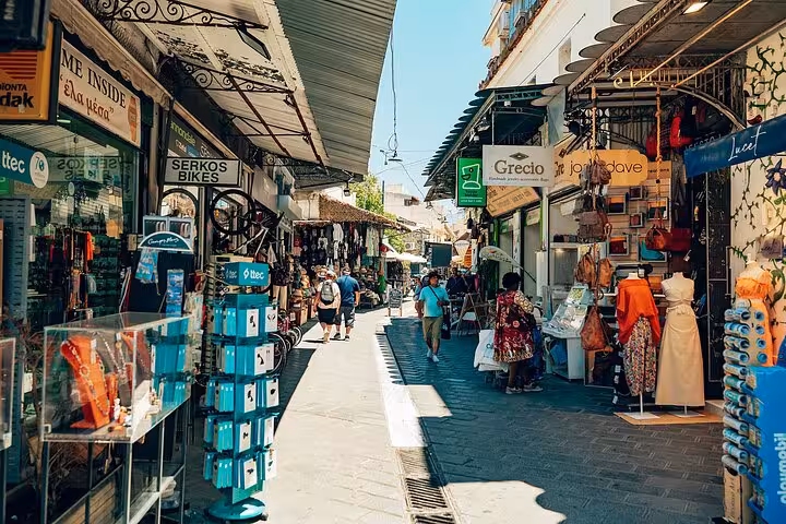 Monastiraki market street in Athens on a small-group walk and taste tour, browsing local shops and stalls