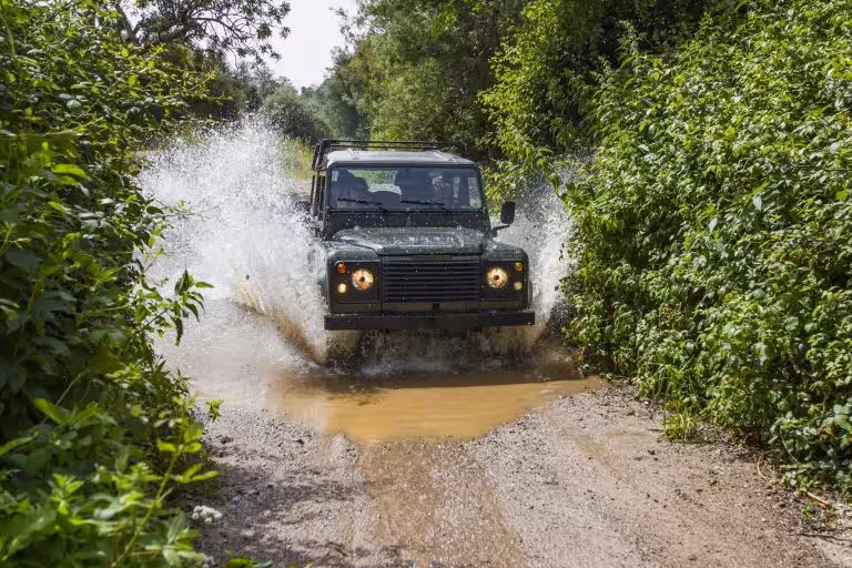 Experience thrilling off-road jeep adventure through muddy trails on the Monchique and Bravura Lake tour.