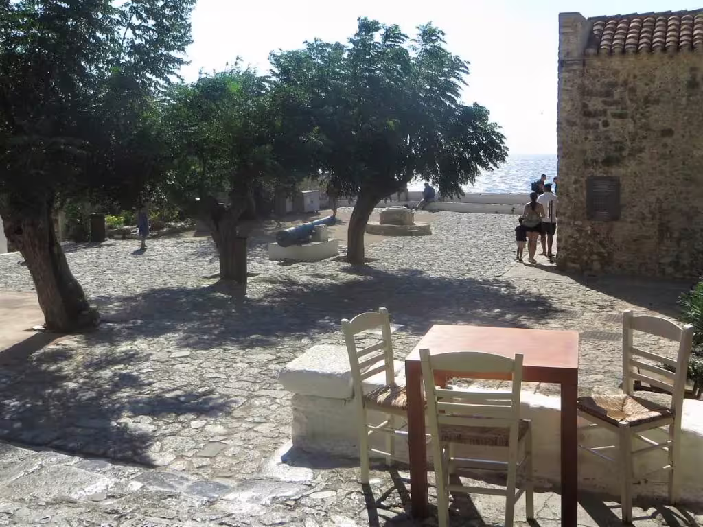 Stone-paved square in Monemvasia with seaside views, a stop on the 2-day private Sparta Mystras Monemvasia tour