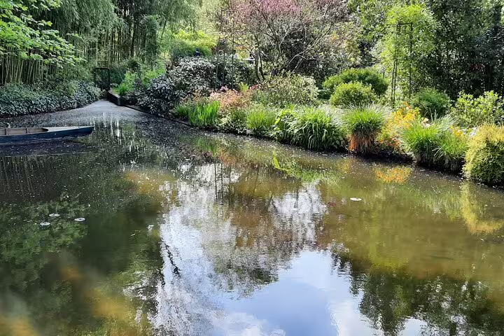 Serene water lily pond in Monet’s Garden, Giverny, on a private day trip from Paris with entry ticket