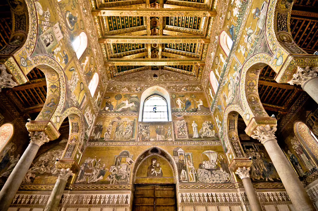 Golden Byzantine mosaics and arches inside Monreale Cathedral near Palermo, featured on the private Monreale, Mondello and Palazzina Cinese tour