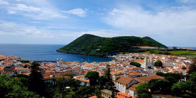 Panoramic view of Monte Brasil and Angra do Heroísmo rooftops on a half-day walking tour, Terceira Island
