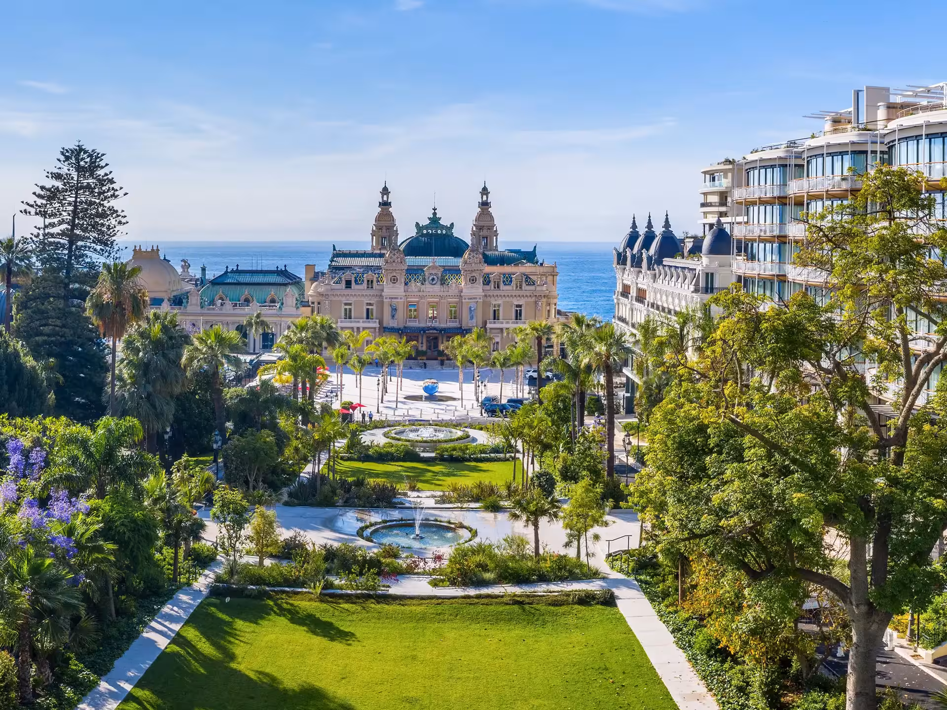 Monte Carlo Casino and lush gardens with Mediterranean Sea views in Monaco