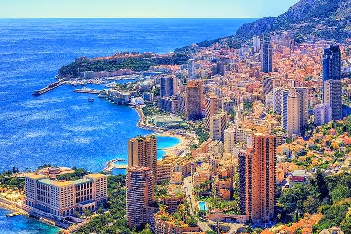 Stunning aerial shot of Monte-Carlo’s luxury skyline and coastline, ideal for exploring with a private guide in Monaco.