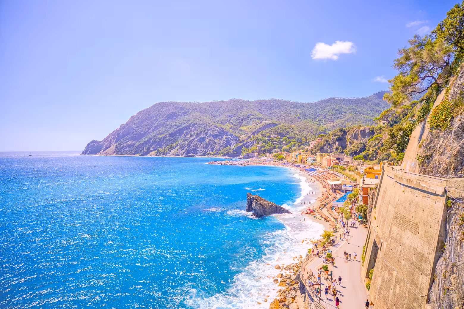 Stunning coastal view of Monterosso al Mare in Cinque Terre with vibrant blue waters and scenic beach.