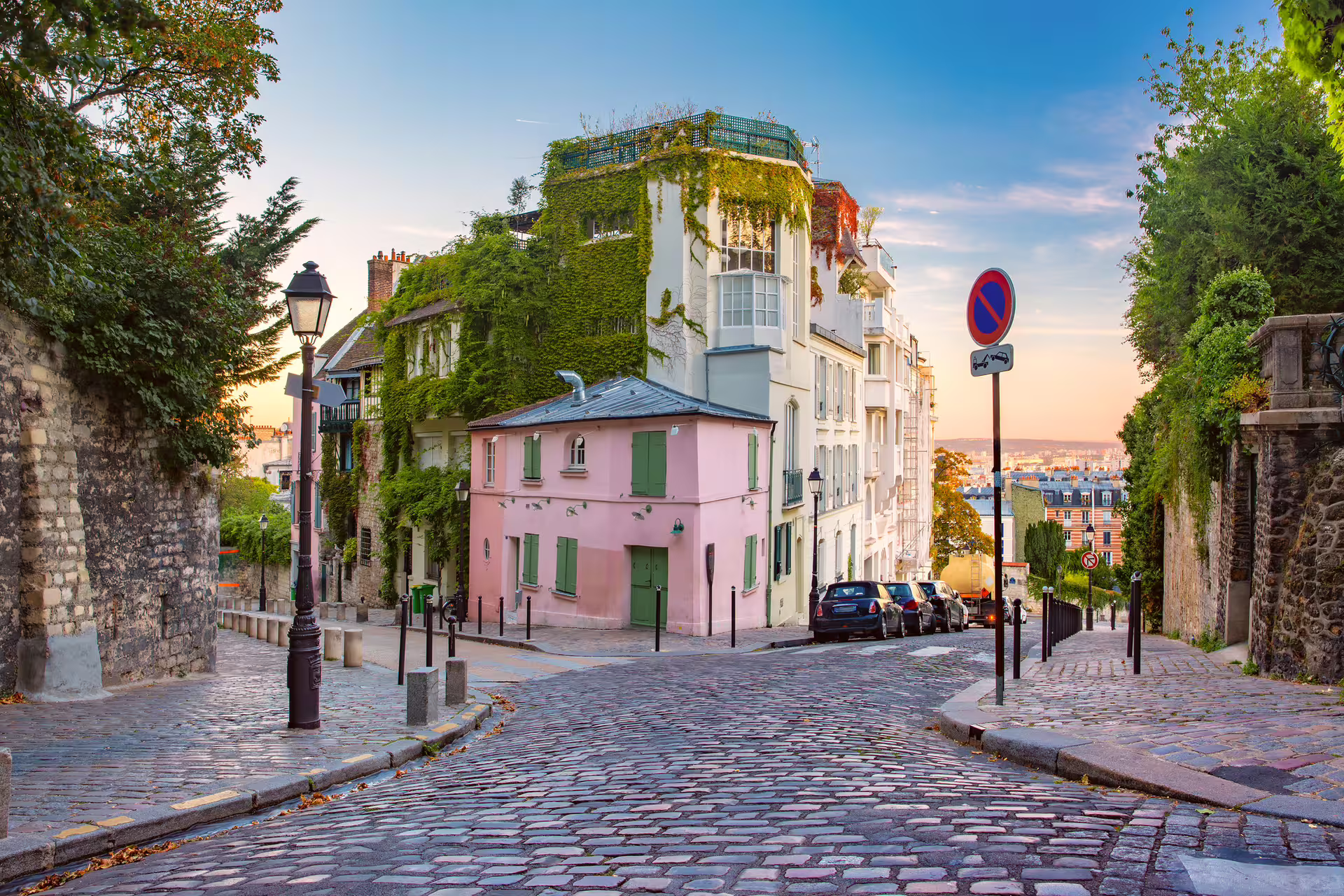 Cobbled street in Montmartre Paris at sunset, scenic stop on 1-day walking tour audioguide
