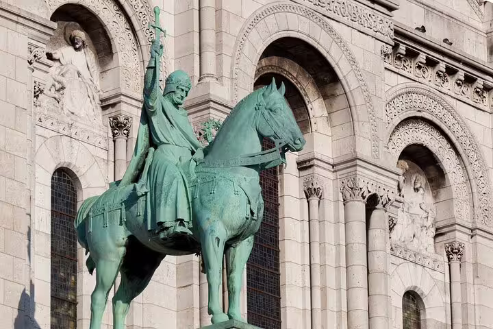 Equestrian statue at Sacré-Cœur Basilica, a key stop on a Montmartre self-guided scavenger hunt tour