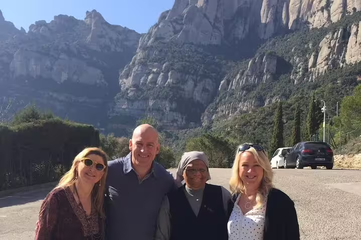 Join a joyful group exploring Montserrat's majestic landscapes, included in the exciting Igualada balloon adventure.