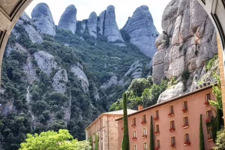 Stunning view of Montserrat's unique rock formations and monastery architecture.