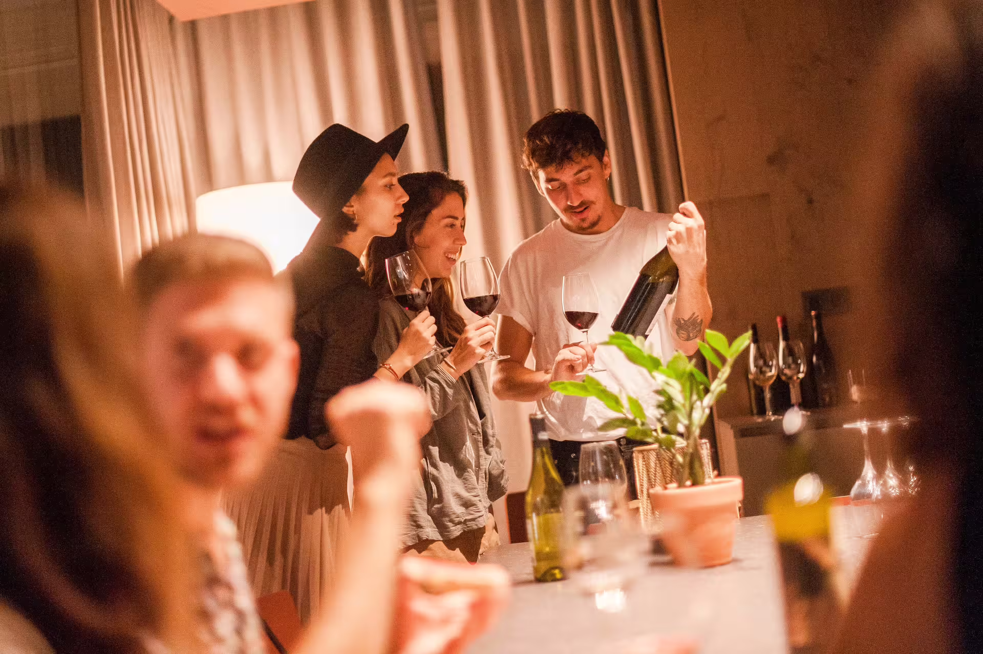 Group of friends enjoying wine tasting during the Montserrat tour, highlighting social and culinary experiences.
