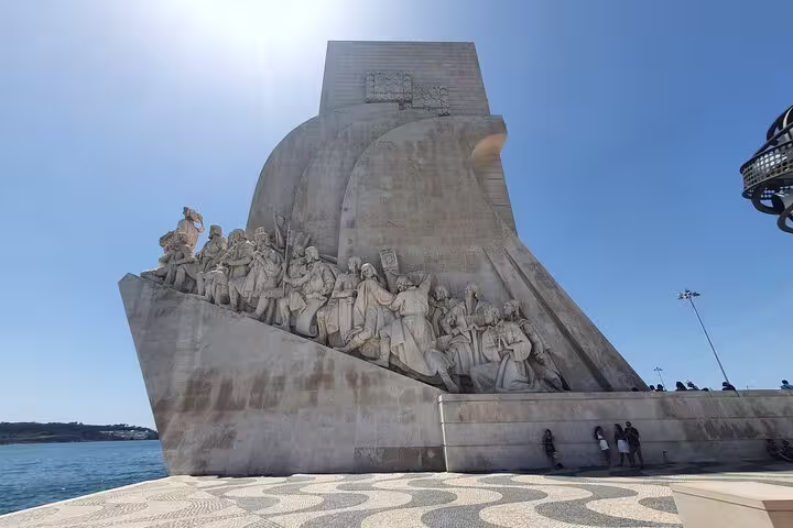 Monument of Discoveries in Belem, Lisbon, viewed on a sunny day, highlighting iconic explorers for the Lisboa private tour.