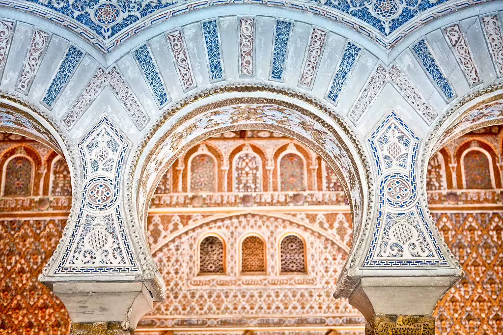 Intricate Moorish architecture at the Alcázar of Seville, showcasing stunning tile work on a self-drive tour through Algarve, Alentejo, and Andalucia.