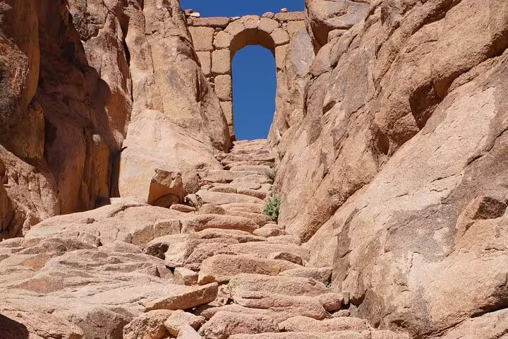 Stone steps leading to an archway on Moses Mountain, Sinai, on a private overnight trip from Dahab
